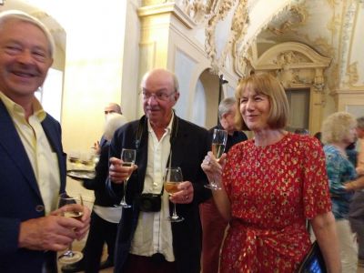 Fisherman at posh loud singing concert
